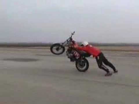 reverse wheeling and reverse stoppie en moto