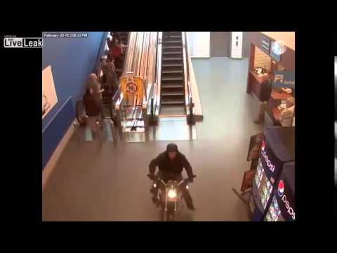 Crazy motorcycle chase through shopping center!