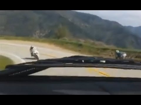 Idiot Driver Almost Hits Motorcycle Head On While Driving On The Wrong Side Of The Road