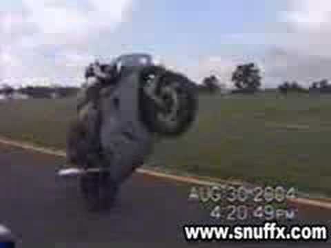 Girl falls off motorcycle