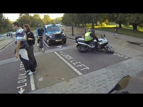 Biker rear ended by Taxi