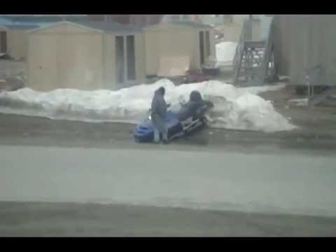 Drunk driver on a snowmobile Пьяный водитель на снегоходе